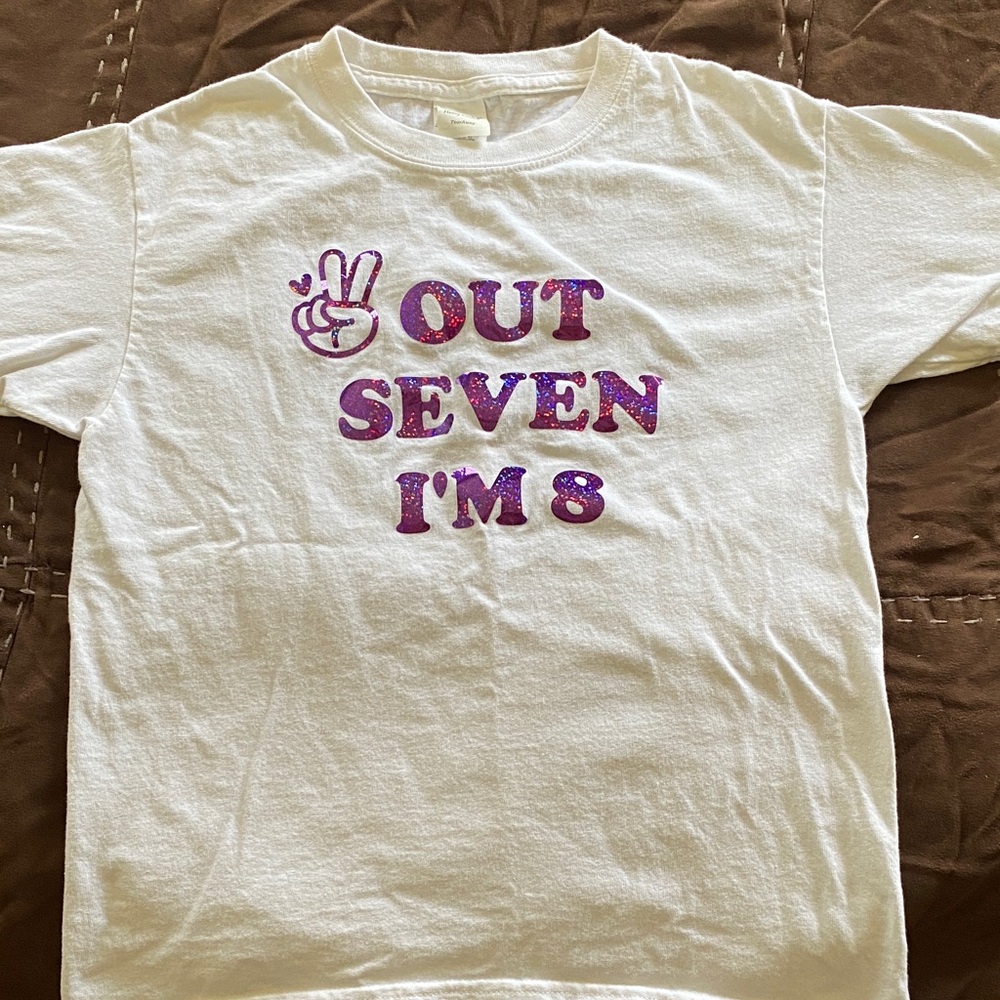 Gildan White Kids Tee with Pink/Purple Glitter "Out Seven I'm 8" Graphic